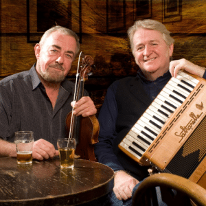 Aly Bain and Phil Cunningham holding instruments